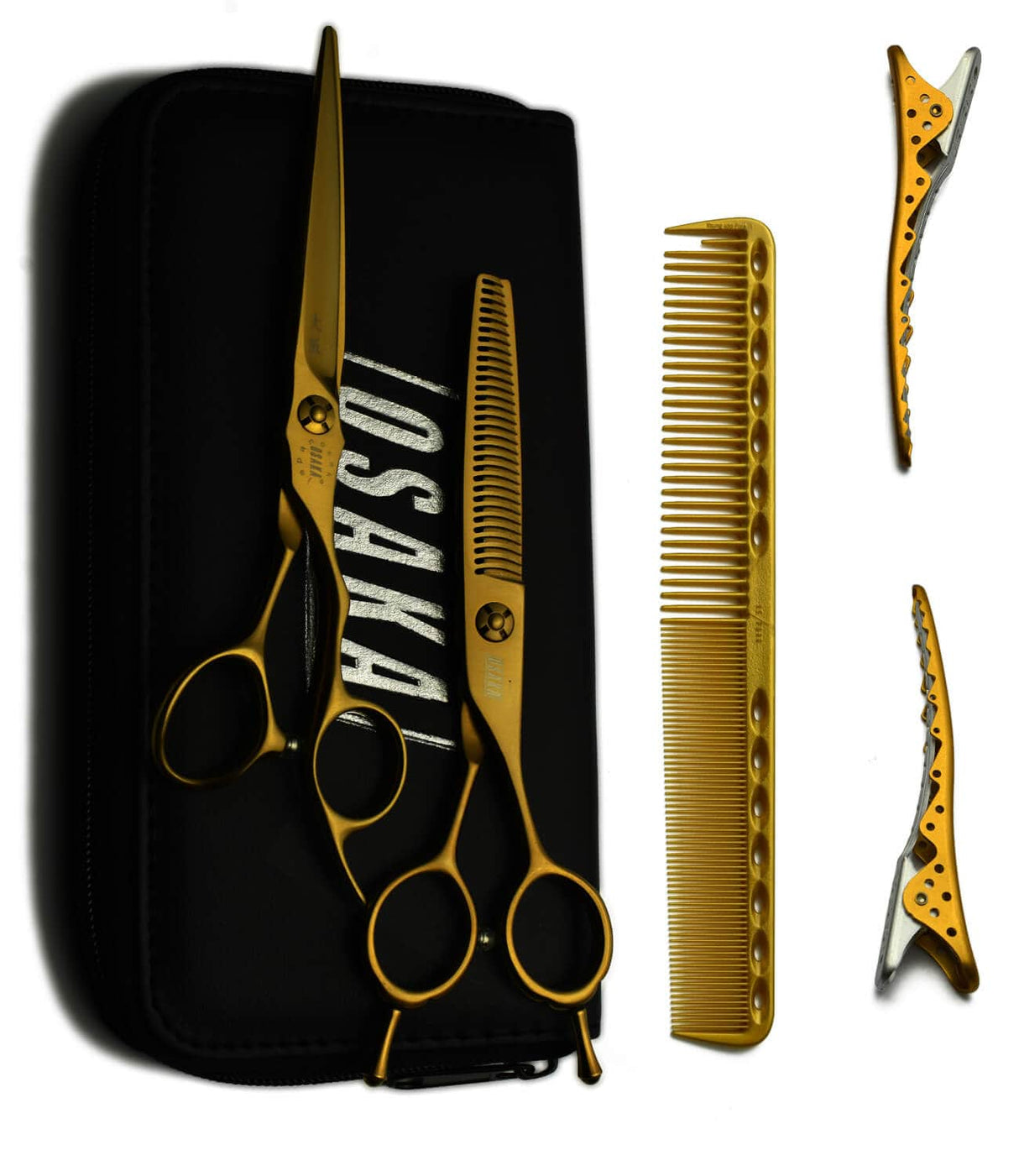 pack de ciseaux osaka composé des ciseaux OSAKA MTGold en version droite et des ciseaux effileurs SCGold. Les peignes yspark 339 dans leur édition limités or mat ainsi que des sépares mèches or YSPARK SHARK complètent le pack
