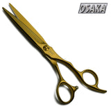 Ciseaux de coiffure OSAKA MT Gold, finition dorée brillante, lame droite japonaise et manche ergonomique pour une coupe précise et élégante en salon.